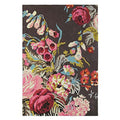 Floral patterned rug with pink, red, and yellow flowers on a dark background