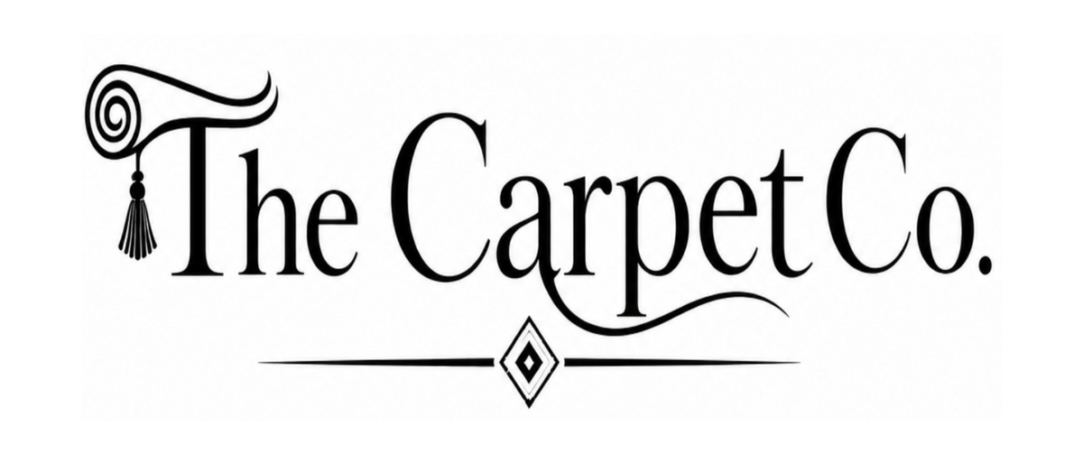 The Carpet Co. logo in black serif lettering with decorative flourishes and a small diamond motif, centered on a plain white background.